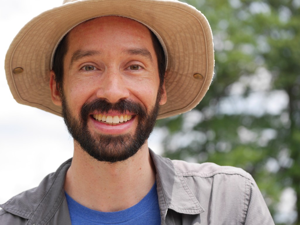 Photo of Mark Dixon, Director/Producer of Inversion. Mark is wearing a tan hat.